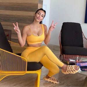 BO + TEE Asymmetrical Sports Bra & Matching Biker Shorts in Orange/Mango